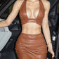 Women’s Solid Color Faux Leather Crop Halter Top With Matching Skirt